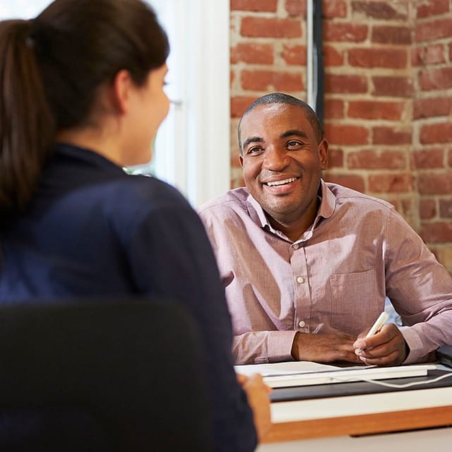 Inhouse professional discussing options with patient