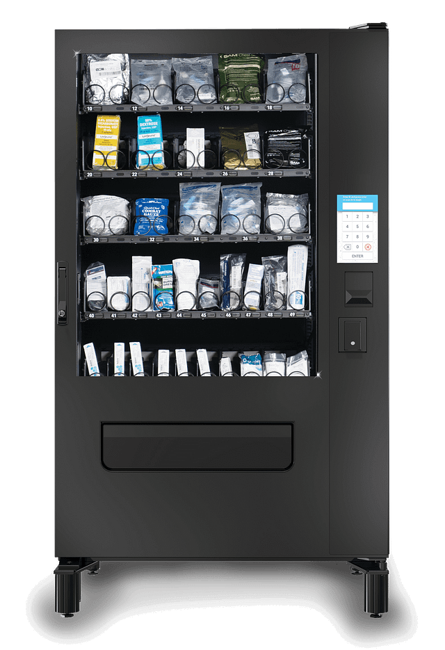 Electronics vending machine with multiple shelves displaying tech accessories and gadgets, featuring a keypad for item selection.