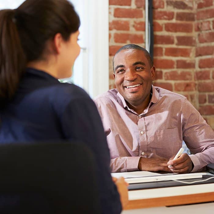 Inhouse professional discussing options with patient