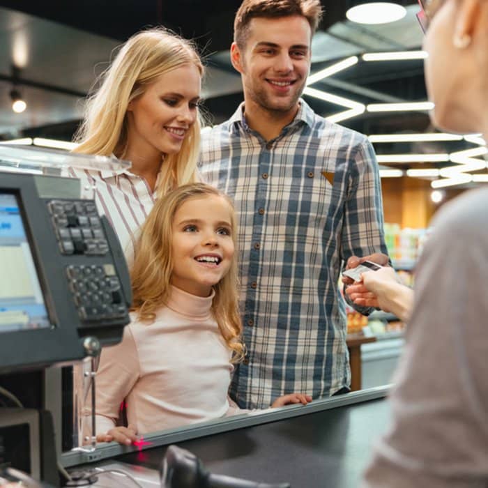 Family in a store POS system