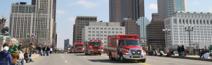 Image of firetrucks and ambulance vehicles going through the city main roads