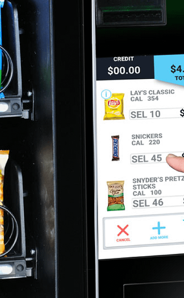 vending guarantee, hand selecting product from vending machine